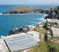 Image of the plaque on Pentire Point, north Cornwall, UK commemorating the composition of the poem 'For The Fallen' 2005
